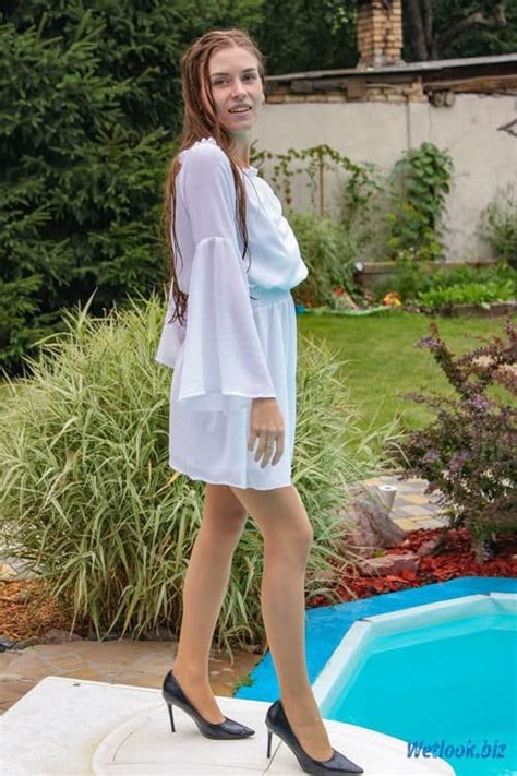 Wetlook Girl In Dress Tights And Heels Swim In It In The Pool R