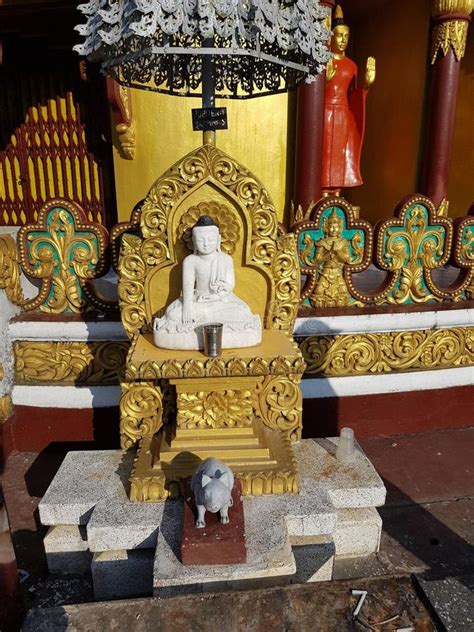 Great Work Of Gold On The White Idol Sitting On The Throne Of The Hindu