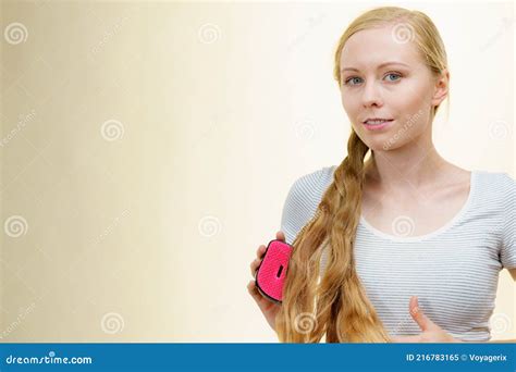 Blonde Girl Brushing Her Long Hair Stock Image Image Of Hair