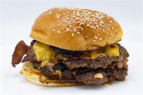 Classic Double Bacon Cheese Smash Burger On A White Background Stock