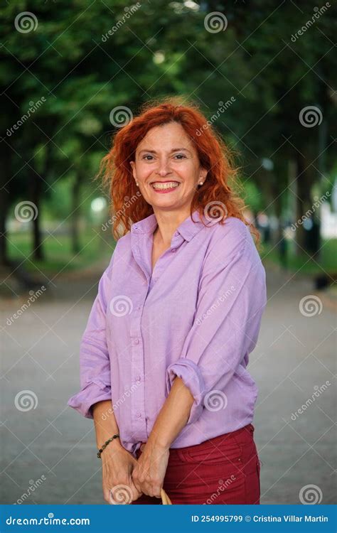 Outdoor Portrait Of Smiling Mature Redhead Woman Stock Image Image