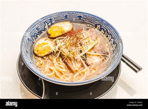 Umami Ramen With Soft Boiled Egg With Char Siew And Bean Sprouts Stock