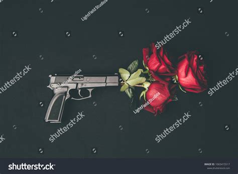 gun  rose petals   royalty  licensable stock