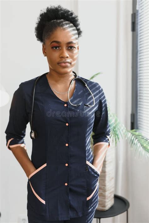 An African American Female Medical Doctor With A Stethoscope In