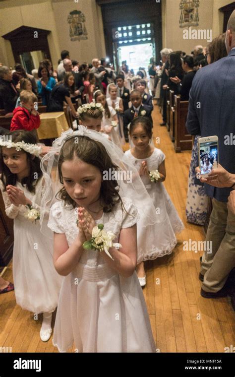 First Holy Communion ceremony for children at a Catholic Church in Brooklyn, New York Stock ...