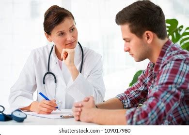 Doctor Talking Her Male Patient Office Stock Photo 109017980 Shutterstock