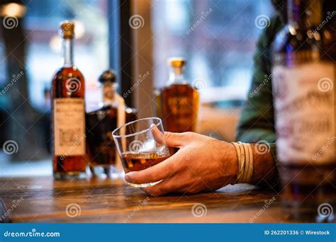 Male Hand Holding A Glass Of Whiskey Stock Photo Image Of Holding