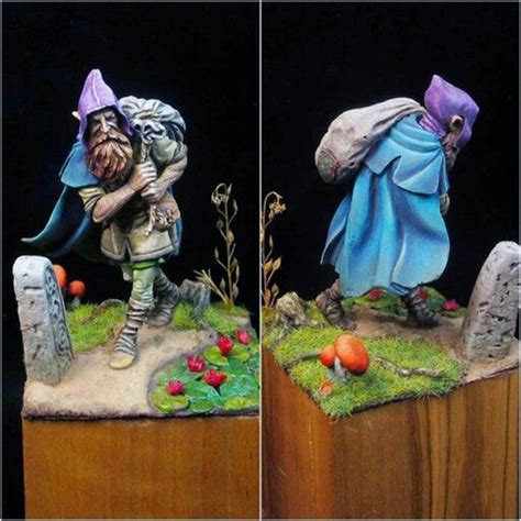 Two Pictures Of The Same Figurine One With A Purple Hat And Another