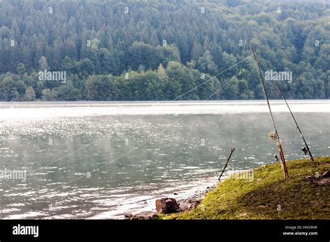Fishing Rod Equipment On A Lake In Misty Spring Morning Stock Photo Alamy