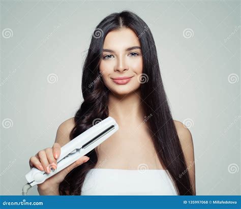 Beautiful Woman With Straight Hair And Curly Hair Using Hair