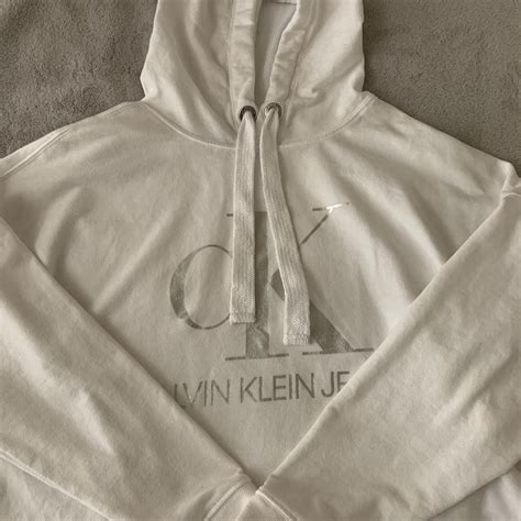 White calvin klein hoodie Super comfy and cute Size... - Depop