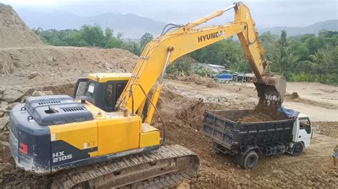 Hyundai Hx210s Excavator Loading Dump Trucks Mining Equipment Youtube