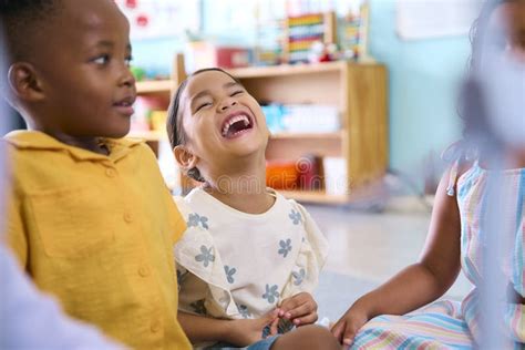 Primary or Elementary School Class Having Fun with Model Wind Turbine ... 