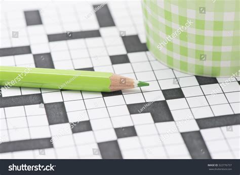 Closeup Crossword Puzzle Green Pencil Conceptual Stock Photo 322776737