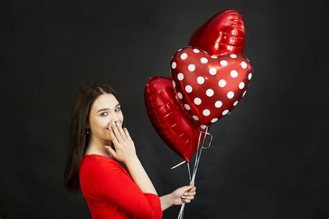 Premium Photo Beautiful Brunette Girl With Red Balloons
