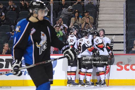 Greg Chase Of The Calgary Hitmen Celebrates After Scoring His Teams