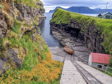 Landscape View Of The Gjogv Harbour Gorge In Eysturoy Island Stock