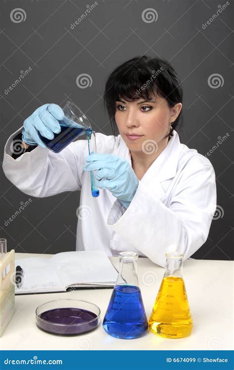 Female Chemist Using Beaker Stock Image Image Of Pouring Surface