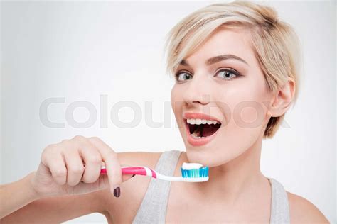 Woman Brushing Teeth