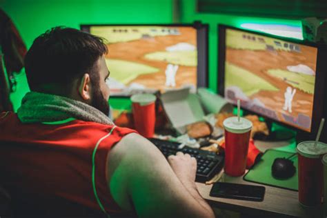 Fat Guy Playing Video Games Stock Photos Pictures And Royalty Free