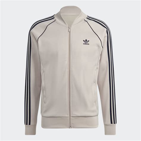 Men S Clothing Adicolor Classics SST Track Jacket Beige Adidas Kuwait