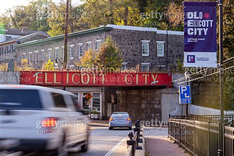 Welcome To Ellicott City Sign Written In Large Capital Letters On Side Of The Bando Railroad