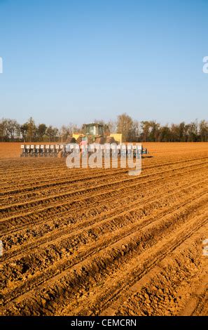 Agriculture A John Deere Tractor And Monosem Twin Row Planter