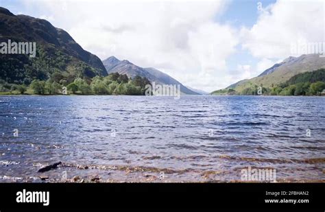 Scottish highland scene mountains and loch Stock Videos & Footage - HD ...