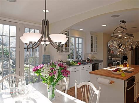 A Futuristic White Chandelier For Modern White Open Space Kitchen With