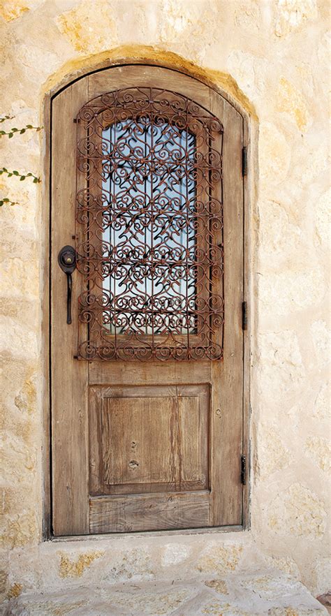 Grilled Exterior Door La Puerta Originals Arched Door With Iron