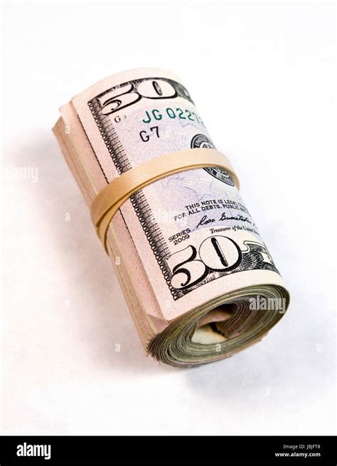 A big wad of cash worth many thousand dollars Stock Photo - Alamy