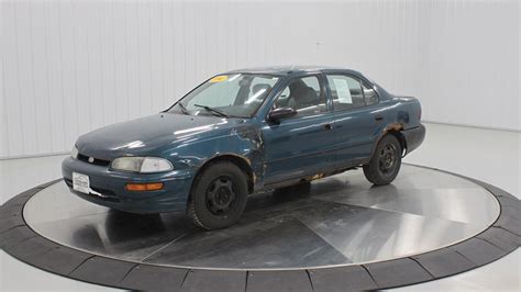 Even Rusty Beater Geo Prizms Deserve Nice Photo Shoots At The Dealership