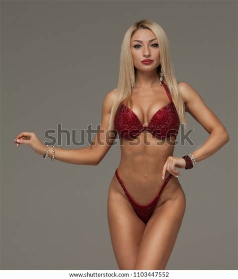 Sexy Athletic Woman Red Bikini Showing Stock Photo 1103447552 Shutterstock