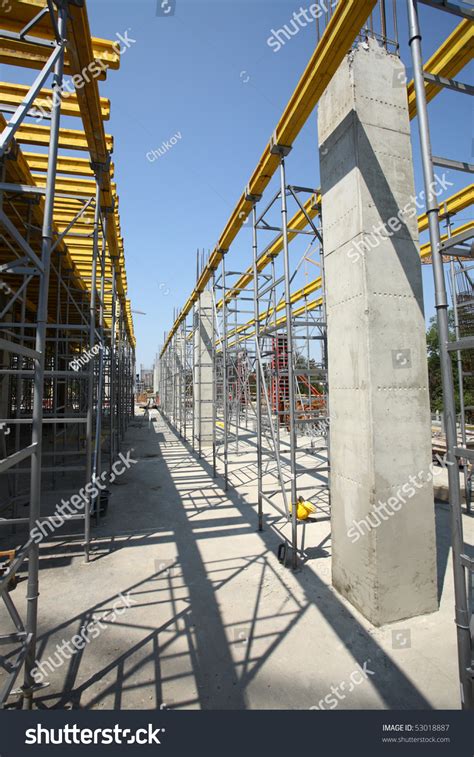 Construction Site With Enforced Concrete Steel Frames Rising Up Stock