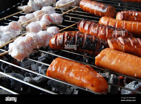 Sausage And Meat On Grill Stock Photo Alamy