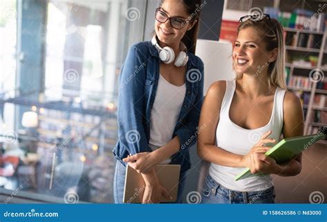 Group Of Friends Studying Together At University Campus Stock Photo