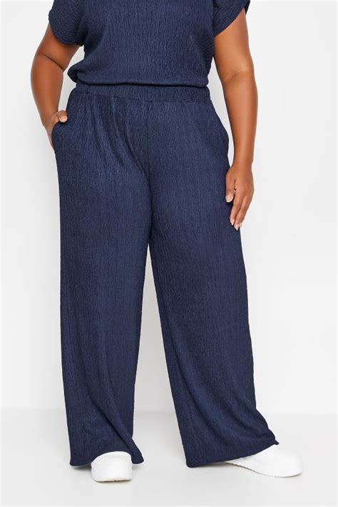 Yours Plus Size Navy Blue Crinkle Plisse Wide Leg Trousers Yours Clothing