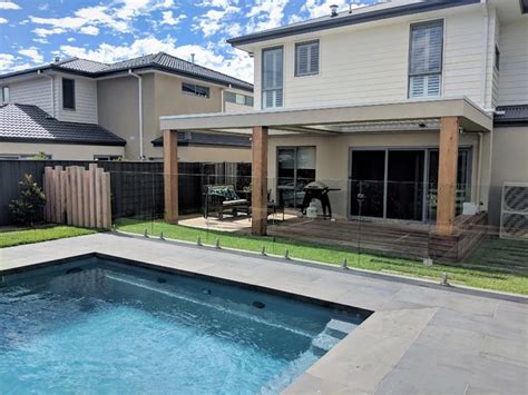 Timber And Rendered Framed Louvre Verandah With Decking Modern