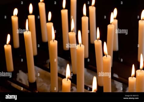 Burning Candles In Church Stock Photo Alamy