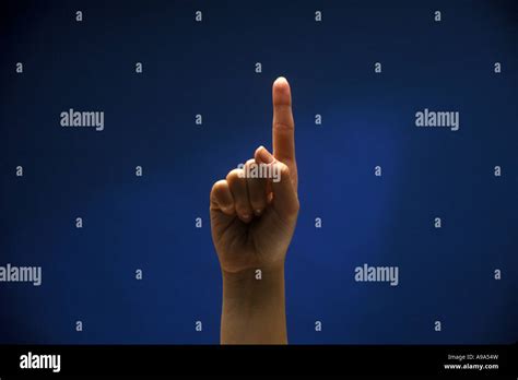 Womans Hand Pointing Up Stock Photo Alamy