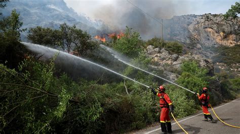 Firefighters battle wildfires across Spain amid heatwave with ...