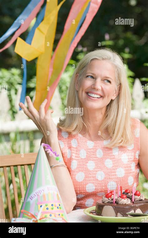 Mature Woman Celebrating Her Birthday Stock Photo Alamy