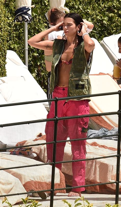 Dua Lipa In A Racy Pink Bikini Relaxes By The Pool In Portofino Italy 2022 13 Photos