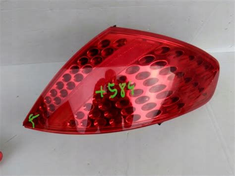 LAMPA PRAWY TYŁ TYLNA W BŁOTNIK PEUGEOT 307 CC 7555091724 oficjalne