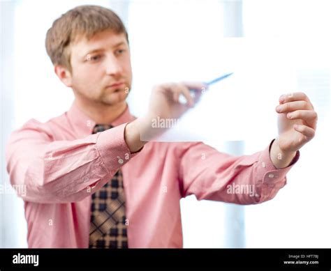 Male Writing Something On Transparent Paper With Stock Photo Alamy