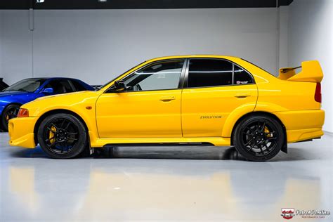 JDM Lancer Evo V GSR Dandelion Yellow Petrol Positive Performance