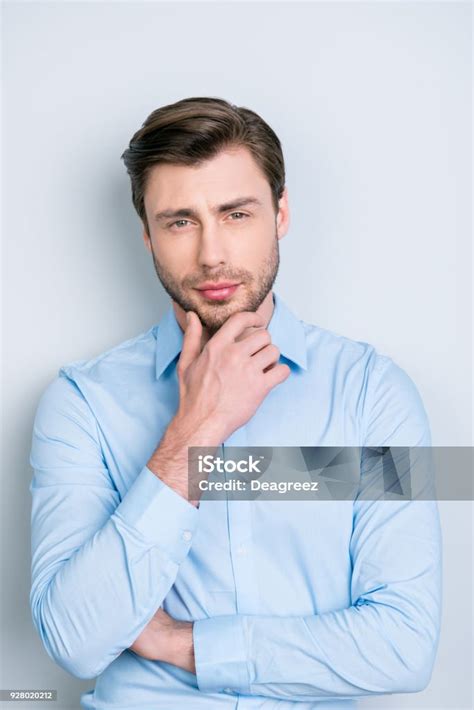 Close Up Portrait Of Handsome Confident Thoughtful Man Holding Hand