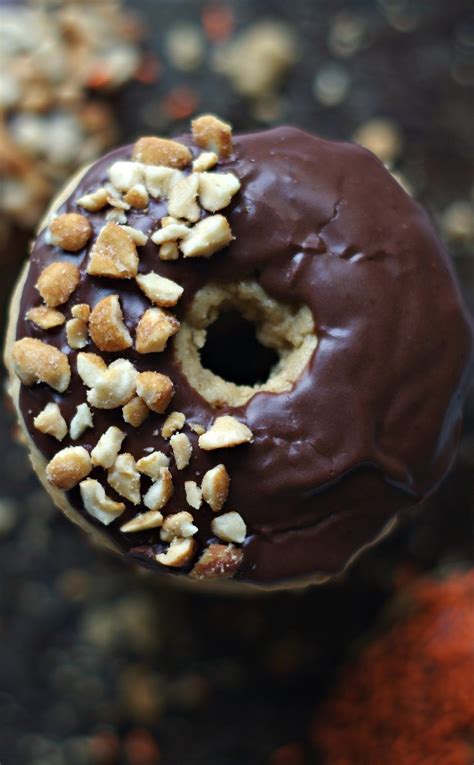 Baked Peanut Butter Doughnuts With Chocolate Glaze And Chopped Peanut