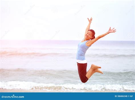 Asian Woman Jumping On Beach Stock Photo Image Of Enjoyment Copy