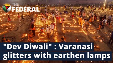 Dev Diwali Devotees Light Up Varanasi With Earthen Lamps Take Holy